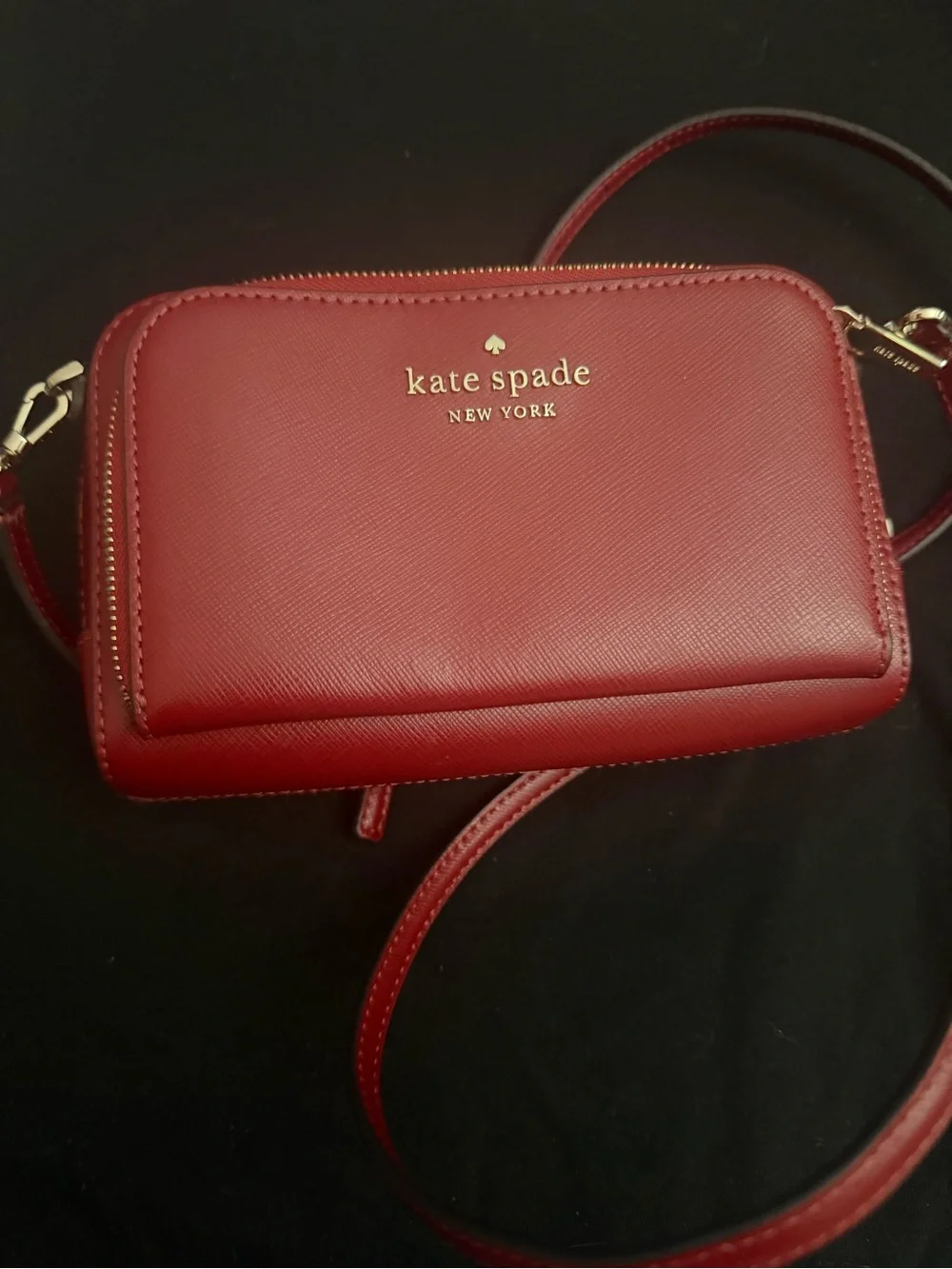 kate spade red crossbody wallet with gold logo